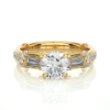 Picture of 1.50 Carat Round and Baguette Cut Three Stone Diamond Ring.