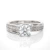 Picture of 1 Carat Center Diamond,embraced by Delicate Pave Band.