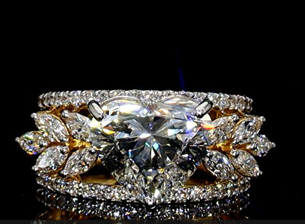 Picture of A Stunning heart Shaped Diamond,surrounded by Marquise And Round Accents.