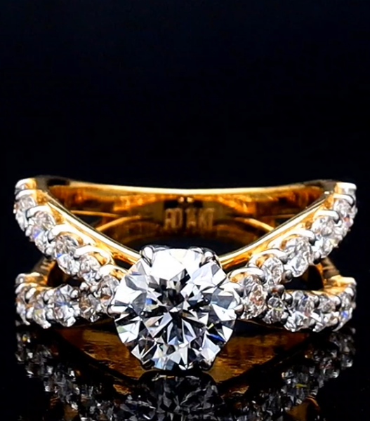 Picture of 2.6 Carat Diamond and smaller Diamonds Lining the Criss Crossing band.