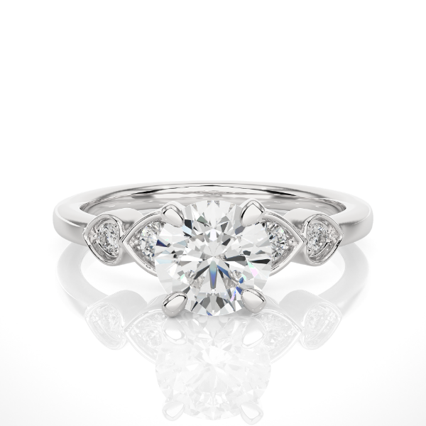 Picture of 1.20 Carat Round Cut Ring,accented with Delicate Heart Shaped Side Stones.