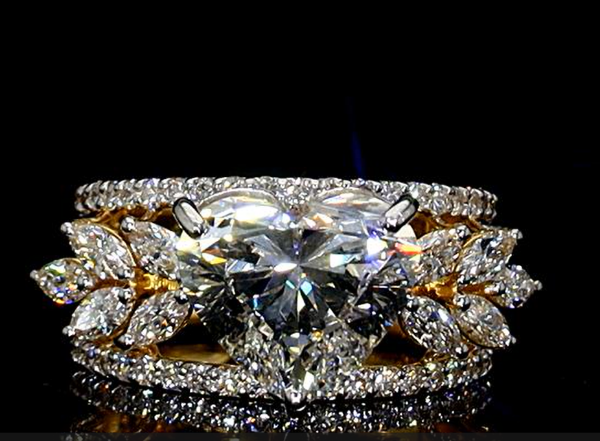 Picture of 3 carat solitaire heart Shaped Diamond,surrounded by Marquise And Round Accents.