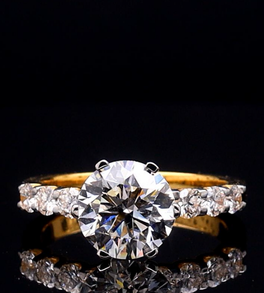 Picture of 3.10 Carat Solitaire Round Diamond with Each Adjacents 0.10 carat Ring.