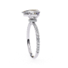 Picture of 1.25 Carat Pear Solitaire Ring Adorned with Smaller Diamonds.