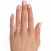 Picture of 1.20 Carat Round Cut Ring,accented with Delicate Heart Shaped Side Stones.