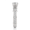 Picture of 1.50 Carat Round and Baguette Cut Three Stone Diamond Ring.
