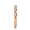 Picture of A Band With A Unique Setting Of Seven Round Diamonds.