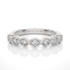 Picture of A Band With A Unique Setting Of Seven Round Diamonds.