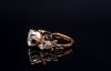 Picture of 2 Carat LGD, nestled in delicate leaf inspired setting adorned with smaller diamonds.