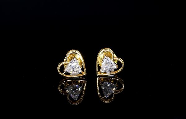 Picture of 1Ct Heart Shaped Earrings Featuring A Triangular Centerpiece.
