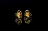 Picture of   1 Carat Heart Shaped Earrings Featuring A Triangular Centerpiece.