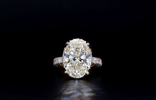 Picture of 7 Carat Oval Solitaire Ring With A Finely Detailed Pave Setting. (9.50CTW Diamonds)
