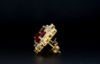 Picture of 3 Carat Stud Earrings With Rubby Center,Princess And Triangle Cut Diamond Accents.