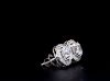 Picture of 3.10 CT Solitaire Earrings, Framed In Sparkling Halos. (4CTW diamonds)